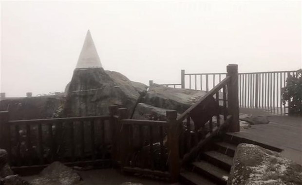 Fansipan Mt. peak in Lao Cai covered in ice and snow